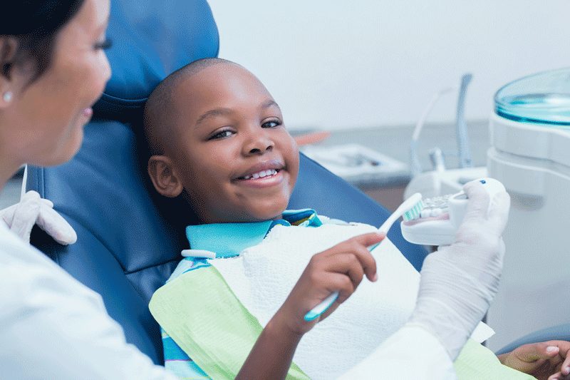 young boy at the dentist