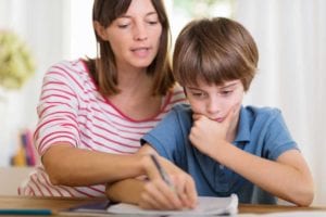 boy student getting help with studies