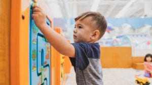 Boy-playing-at-therapy-center-for-speech-language-pathology-and-occupational-therapy