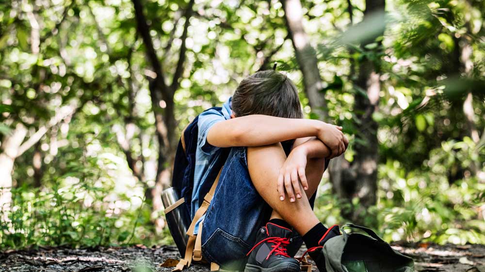 Boy-with autism lost-after-wandering-in-the-forest-first-responders-find-him