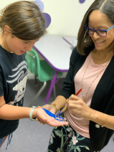 LearningRx Staunton-Harrisonburg: Student getting her hand painted