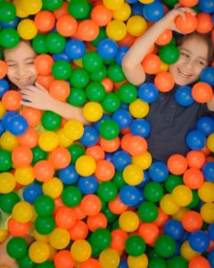 Kids playing in sensory ball pit at First Step