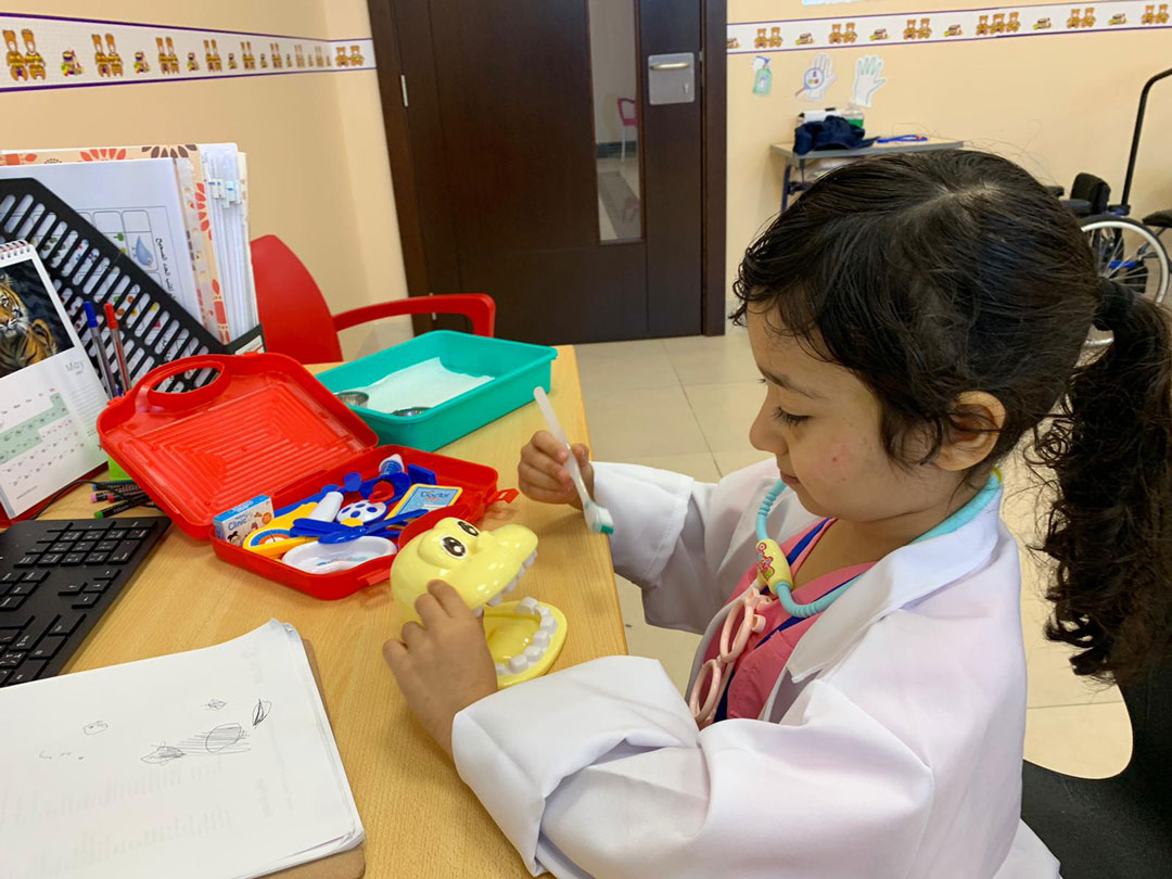 Athena Center Student working on fine motor skills