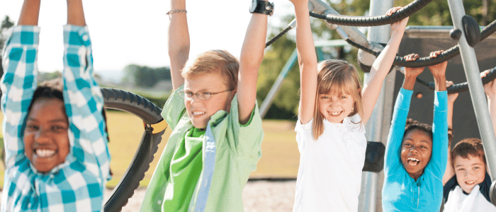 A group of children playing in the playground.